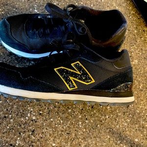 Women’s Size 9 New Balance 515 Black and Gold very good condition